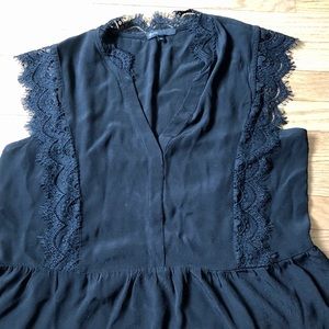 Gibson peplum tip with lace detailing.